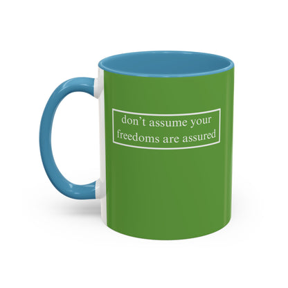 don't assume your freedoms are assured, White font, Green Accent Mug by cypherpunkgear.com