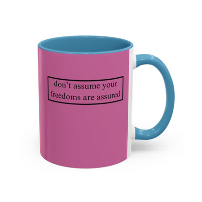 don't assume your freedoms are assured, Black font, Pink Accent Mug by cypherpunkgear.com