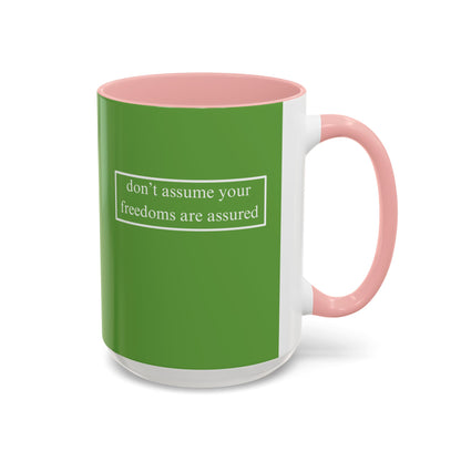 don't assume your freedoms are assured, White font, Green Accent Mug by cypherpunkgear.com