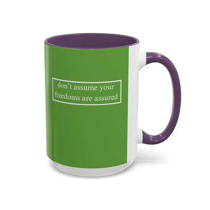 don't assume your freedoms are assured, White font, Green Accent Mug by cypherpunkgear.com