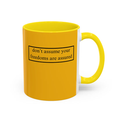 don't assume your freedoms are assured, Black font, Yellow Accent Mug by cypherpunkgear.com