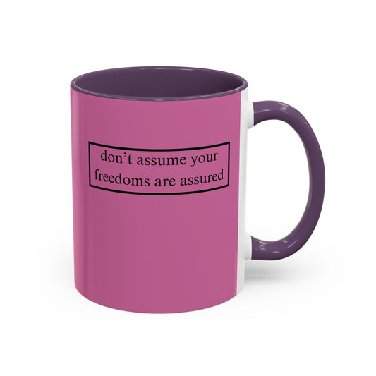 don't assume your freedoms are assured, Black font, Pink Accent Mug by cypherpunkgear.com