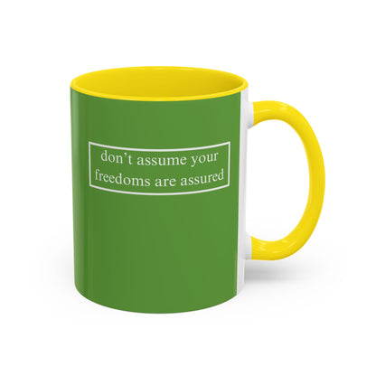 don't assume your freedoms are assured, White font, Green Accent Mug by cypherpunkgear.com