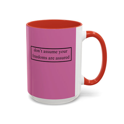 don't assume your freedoms are assured, Black font, Pink Accent Mug by cypherpunkgear.com