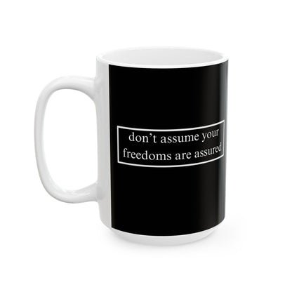 don't assume your freedoms are assured, White font, Black/White Mug by cypherpunkgear.com