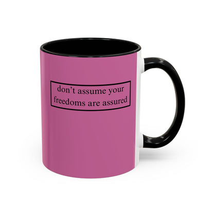 don't assume your freedoms are assured, Black font, Pink Accent Mug by cypherpunkgear.com