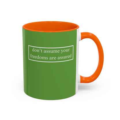 don't assume your freedoms are assured, White font, Green Accent Mug by cypherpunkgear.com