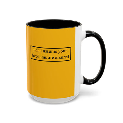 don't assume your freedoms are assured, Black font, Yellow Accent Mug by cypherpunkgear.com