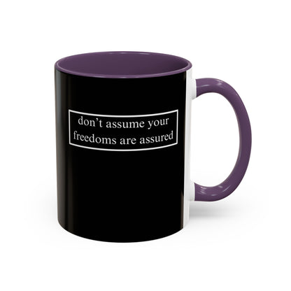 don't assume your freedoms are assured, White font, Black Accent Mug by cypherpunkgear.com