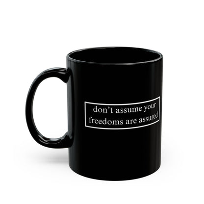 don't assume your freedoms are assured, White font, Black Mug by cypherpunkgear.com