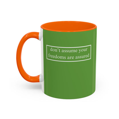 don't assume your freedoms are assured, White font, Green Accent Mug by cypherpunkgear.com