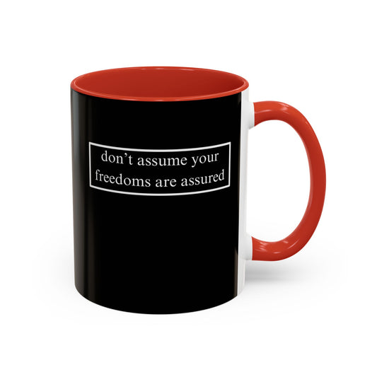 don't assume your freedoms are assured, White font, Black Accent Mug by cypherpunkgear.com