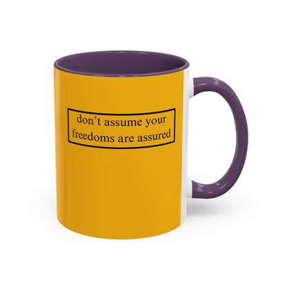 don't assume your freedoms are assured, Black font, Yellow Accent Mug by cypherpunkgear.com