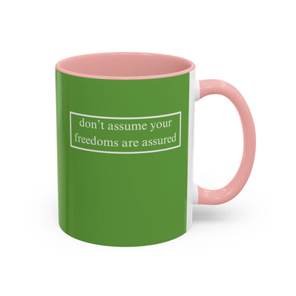 don't assume your freedoms are assured, White font, Green Accent Mug by cypherpunkgear.com
