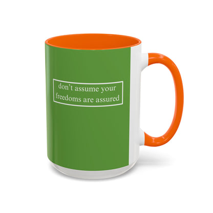 don't assume your freedoms are assured, White font, Green Accent Mug by cypherpunkgear.com