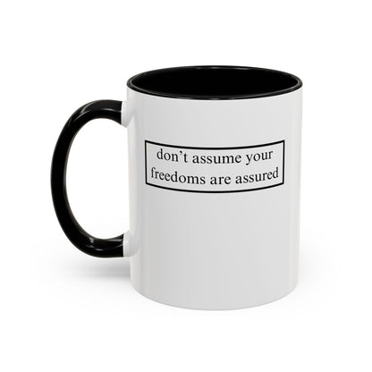 don't assume your freedoms are assured, Black font, White Accent Mug by cypherpunkgear.com