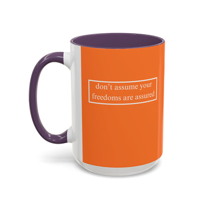 don't assume your freedoms are assured, White font, Orange Accent Mug by cypherpunkgear.com