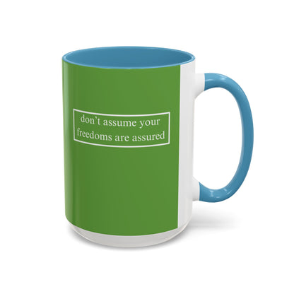 don't assume your freedoms are assured, White font, Green Accent Mug by cypherpunkgear.com