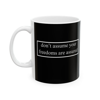 don't assume your freedoms are assured, White font, Black/White Mug by cypherpunkgear.com