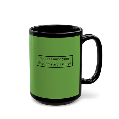don't assume your freedoms are assured, Black font, Green/Black Mug by cypherpunkgear.com