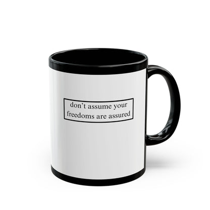 don't assume your freedoms are assured, Black font, White/Black Mug by cypherpunkgear.com