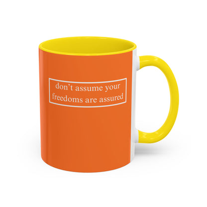 don't assume your freedoms are assured, White font, Orange Accent Mug by cypherpunkgear.com