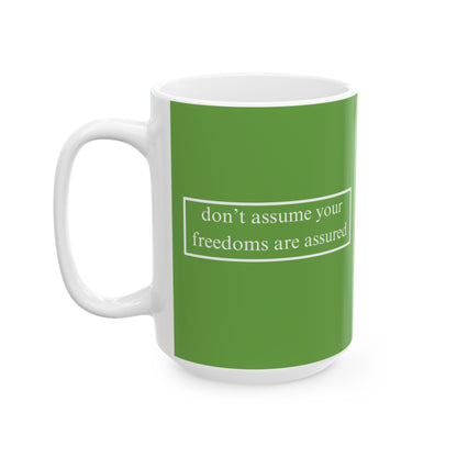 don't assume your freedoms are assured, White font, Green/White Mug by cypherpunkgear.com