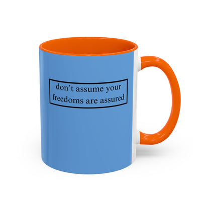 don't assume your freedoms are assured, Black font, Light Blue Accent Mug by cypherpunkgear.com