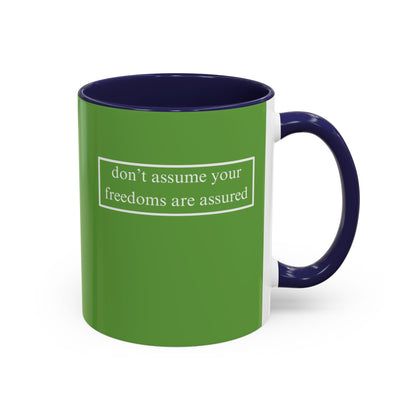 don't assume your freedoms are assured, White font, Green Accent Mug by cypherpunkgear.com