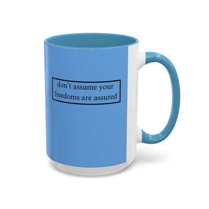 don't assume your freedoms are assured, Black font, Light Blue Accent Mug by cypherpunkgear.com