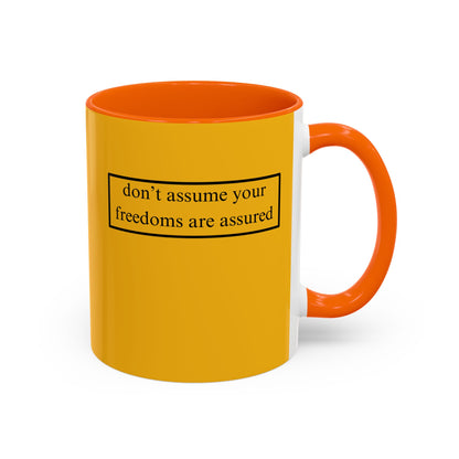 don't assume your freedoms are assured, Black font, Yellow Accent Mug by cypherpunkgear.com
