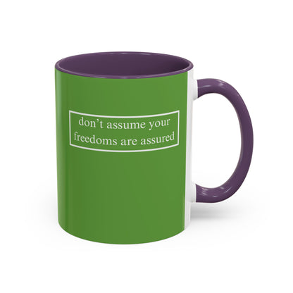 don't assume your freedoms are assured, White font, Green Accent Mug by cypherpunkgear.com