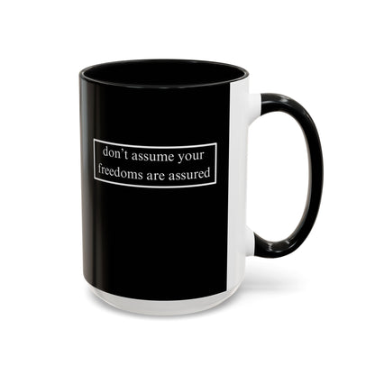 don't assume your freedoms are assured, White font, Black Accent Mug by cypherpunkgear.com