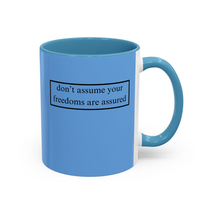 don't assume your freedoms are assured, Black font, Light Blue Accent Mug by cypherpunkgear.com