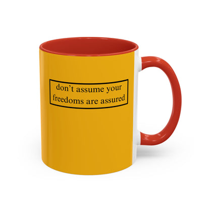 don't assume your freedoms are assured, Black font, Yellow Accent Mug by cypherpunkgear.com