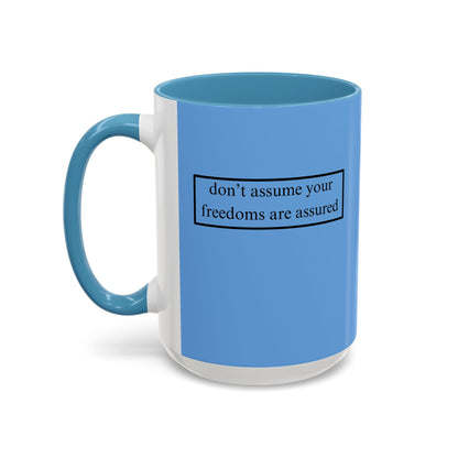 don't assume your freedoms are assured, Black font, Light Blue Accent Mug by cypherpunkgear.com