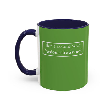 don't assume your freedoms are assured, White font, Green Accent Mug by cypherpunkgear.com