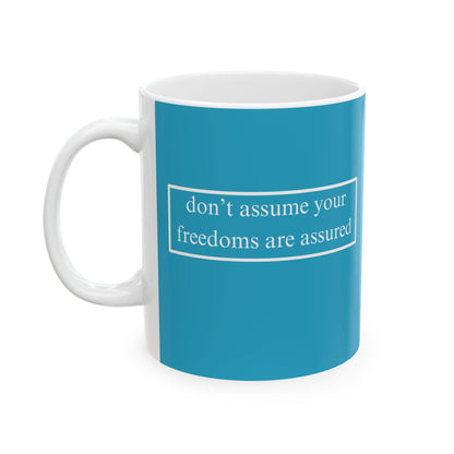 don't assume your freedoms are assured, White font, Turquoise/White Mug by cypherpunkgear.com