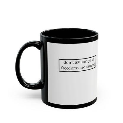 don't assume your freedoms are assured, Black font, White/Black Mug by cypherpunkgear.com