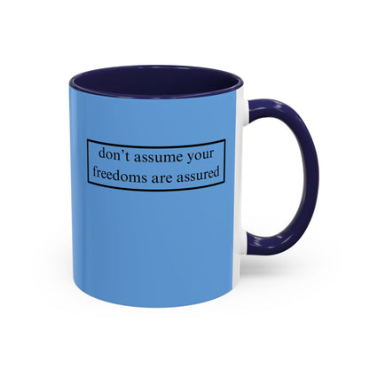 don't assume your freedoms are assured, Black font, Light Blue Accent Mug by cypherpunkgear.com