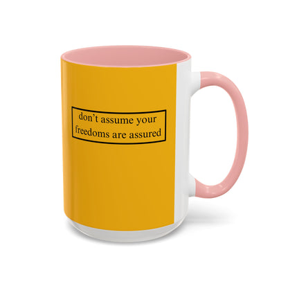 don't assume your freedoms are assured, Black font, Yellow Accent Mug by cypherpunkgear.com