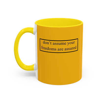 don't assume your freedoms are assured, Black font, Yellow Accent Mug by cypherpunkgear.com