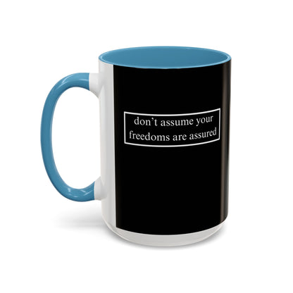 don't assume your freedoms are assured, White font, Black Accent Mug by cypherpunkgear.com