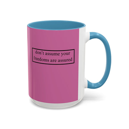 don't assume your freedoms are assured, Black font, Pink Accent Mug by cypherpunkgear.com
