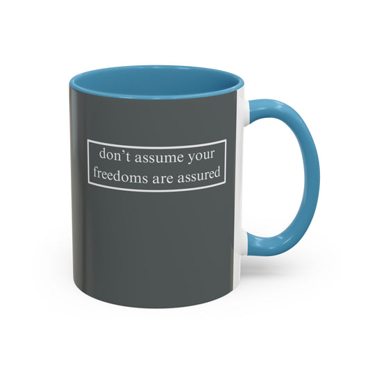 don't assume your freedoms are assured, White font, Grey Accent Mug by cypherpunkgear.com