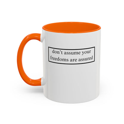 don't assume your freedoms are assured, Black font, White Accent Mug by cypherpunkgear.com