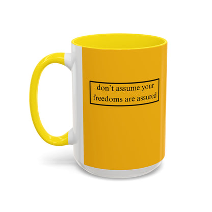 don't assume your freedoms are assured, Black font, Yellow Accent Mug by cypherpunkgear.com