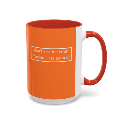don't assume your freedoms are assured, White font, Orange Accent Mug by cypherpunkgear.com