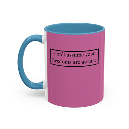 don't assume your freedoms are assured, Black font, Pink Accent Mug by cypherpunkgear.com
