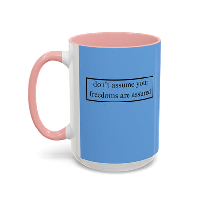 don't assume your freedoms are assured, Black font, Light Blue Accent Mug by cypherpunkgear.com